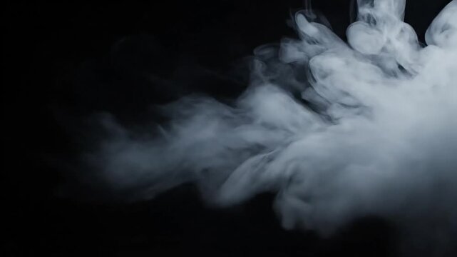white smoke explosion on black background