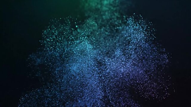 Vibrant blue and purple particles exploding on dark background