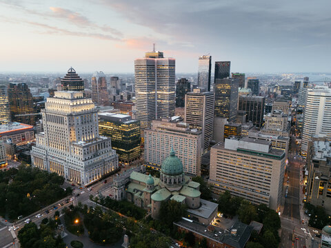 Aerial skyline of Montreal with Mary Queen of the World Cathedral and downtown skyscrapers at sunset, Quebec, Canada. g.