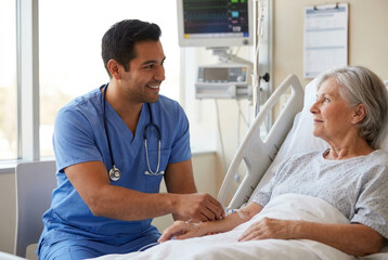 Fototapeta premium Compassionate Male Nurse Checking IV Line of Senior Female Patient in Hospital Bed