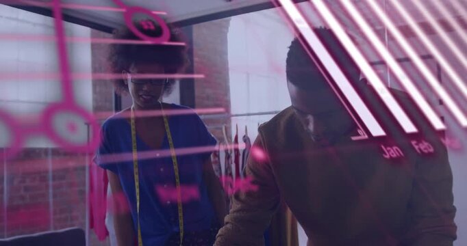 Animated charts sweeping frame driving designers editing sketches while advising on fashion line
