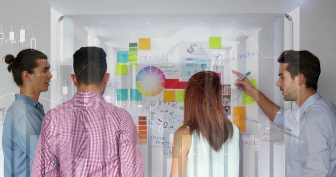Triggered by right person writing, four team members arranging sticky notes on board for ideation