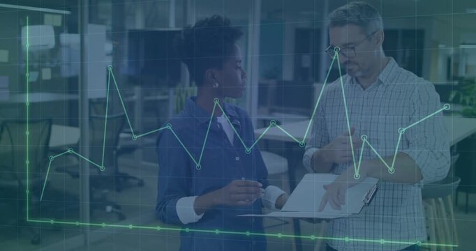 Faint grid and data line appearing as two colleagues pointing, tapping clipboard, reviewing data