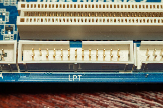 Detailed view of lpt parallel port connector on motherboard with gold pins