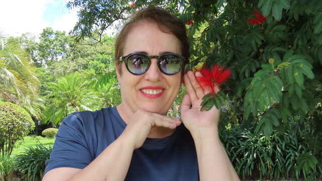 Woman with red flower