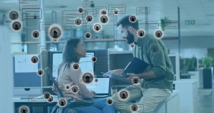 Man showing folder to woman typing on laptop, for office review, icons and chat bubbles drifting