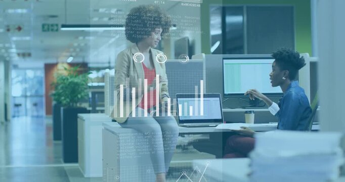 Two coworkers sharing papers and tapping tablet, causing finance charts emerging for analyzing data