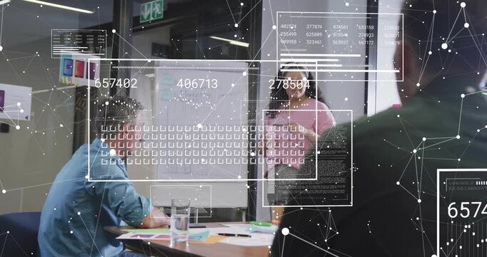 Woman presenting whiteboard during business meeting using remote and pointing causing data overlays