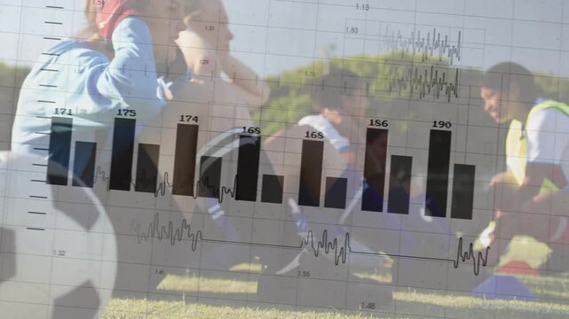 Training soccer team doing crunches on grass, with soccer ball, cones, fluorescent vest, analytics