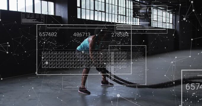 HUD prompt initiating movement, mid-adult woman performing alternating rope waves to build strength