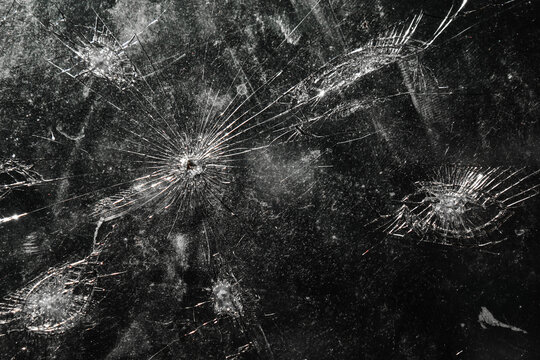 The pattern on the glass is cracked.  damage to the glass.  cracked texture