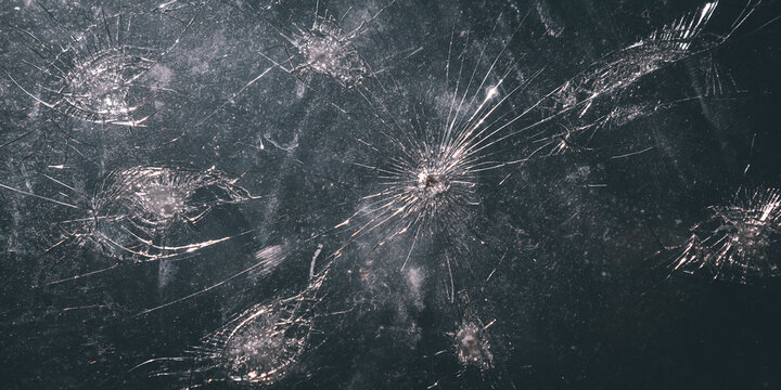 The pattern on the glass is cracked.  damage to the glass.  cracked texture