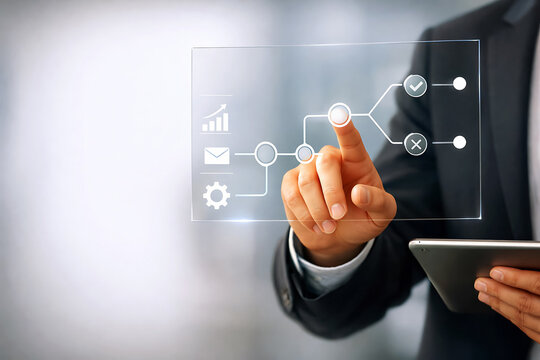 Businessman interacting with a digital flowchart on a transparent screen