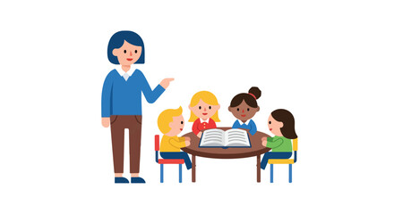 A female teacher stands pointing towards four diverse children sitting at a round table reading a book together in a classroom setting. © Ahmad