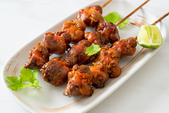 grilled chicken gizzard skewer with herbs and spices