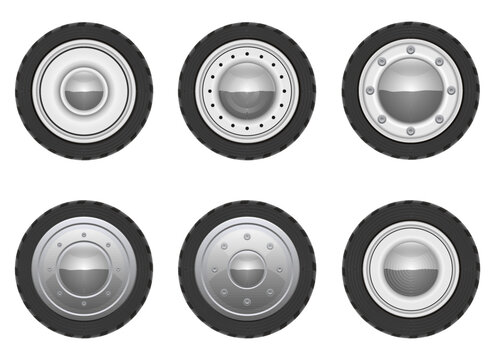 Array of tires and wheels with chrome rims on a white background.