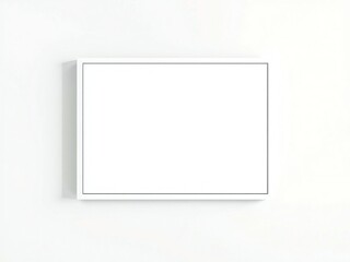 Obraz premium A blank white picture frame on a wall