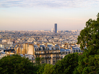 Fototapeta premium Old Paris view of densely packed buildings of the city from elevated position on Montmartre.