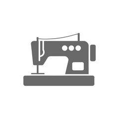 Simple black icon depicting a vintage sewing machine on a solid base