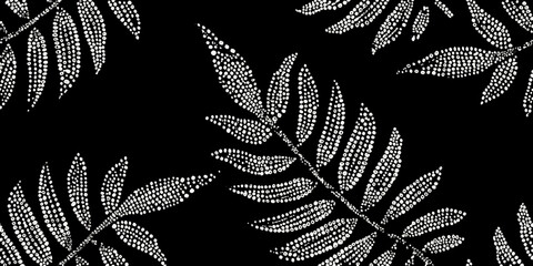 Stylized fern leaves create a repeating black and white pattern © Anik