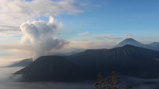 4k Wide shot of Mount Semeru and Mount Batok with mount bromo Erupting  , East Java Indonesia