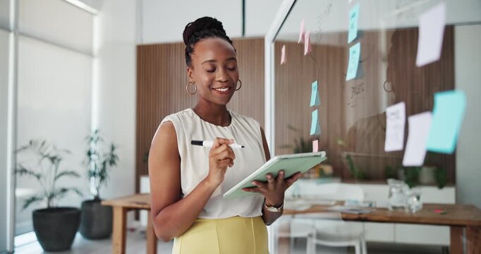 Glass wall, tablet and black woman in office with information, ideas or research for creative project. Board, technology and magazine editor planning for article with publishing in startup agency.