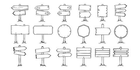 A collection of various blank signs and billboards on stands are displayed outdoors. © Dhani