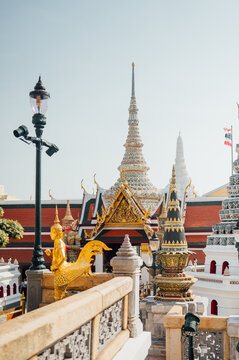 Temple courtyard with prang towers at Grand Palace Bangkok