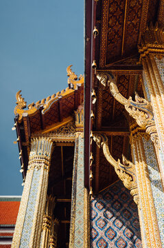 Ornate temple roof and columns detail at Grand Palace Bangkok