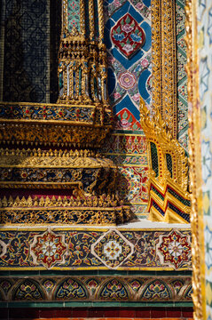 Ornate temple facade mosaic and gold at Grand Palace Bangkok