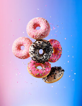 Levitation donuts on gradient background