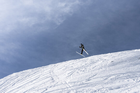 Skier jumping on a ski slope