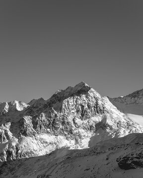 Minimalist black and white of a mountain peak
