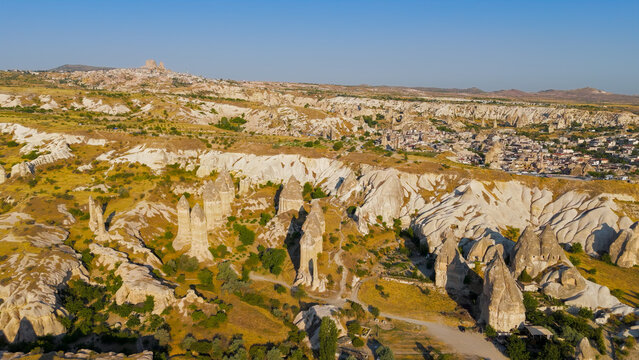Goreme, Nevsehir, Turkey. Drone view of the distinctive phallic rock pillars and eroded formations that define the landscape of Gorkundere Valley.. Aerial View
