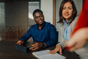Diverse business team collaborating during office meeting