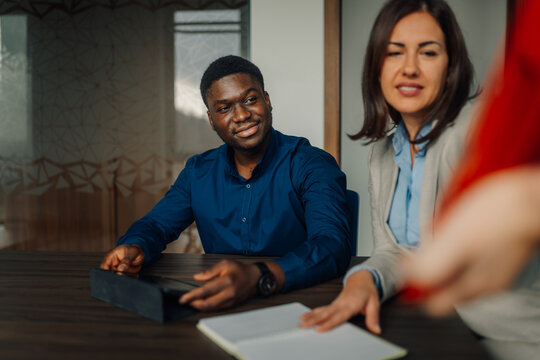Diverse business team collaborating during office meeting