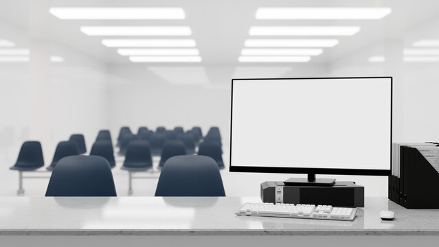 White screen computer on marble counter across row of chairs for registration or interview in a hall