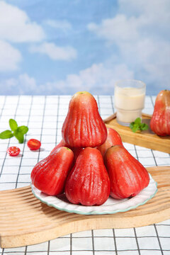 Fresh Red Rose Apples Wax Apples from Hainan China on Wooden Board Healthy Tropical Fruit Display