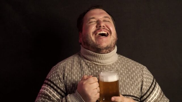 Beer. Oktoberfest. Handsome man drinking beer of glass. Smiling bearded hipster drinking craft beer. 