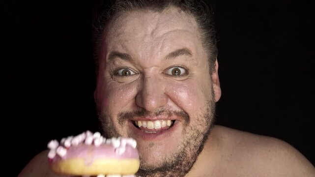 A funny fat man overeats tasty and unhealthy food.