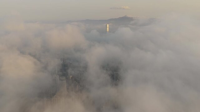 Rising above the clouds Hong Kong City Reveal Aerial