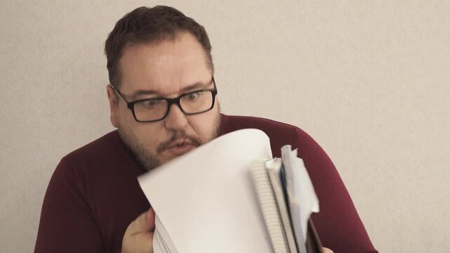 A man swears and argues with his interlocutor