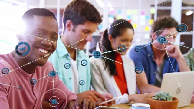 Front man tapping tablet and starting network overlays linking team devices, enabling tech teamwork