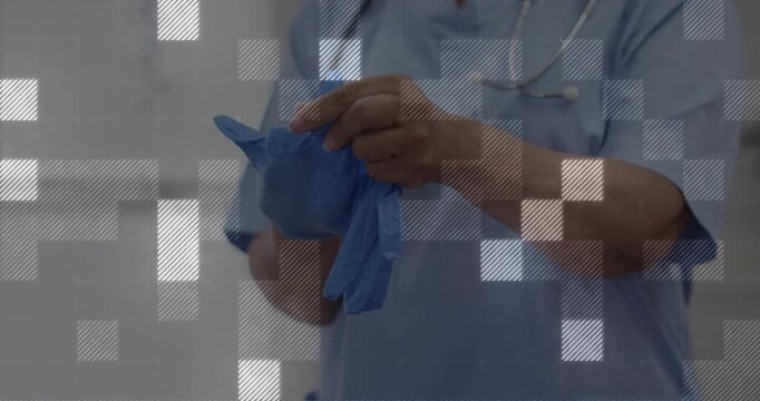 Female medic donning blue gloves preparing for patient exam while pixelated overlay over hands