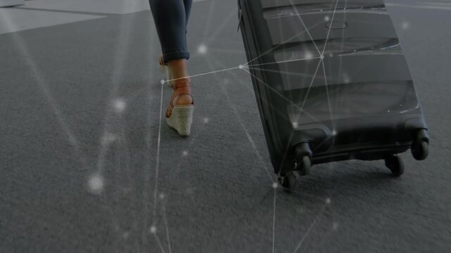 Woman pulling carry-on walking toward gate, step initiating travel network overlay mapping wheels