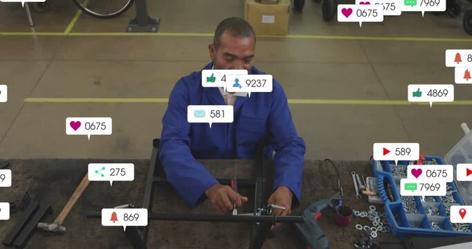 Assembler tightening clamp on bench to assemble frame, wrench action initiating notification icons