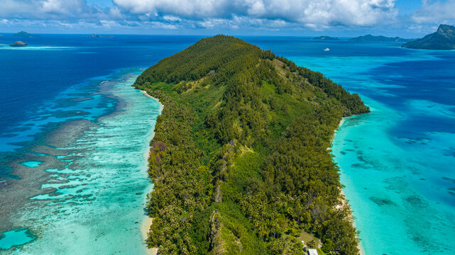 Aerial view of Aukena island in Gambier archipelago French Polynesia