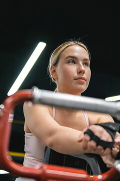 Athlete focused on functional fitness and strength training in gym