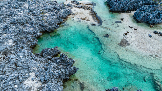 Aerial view of turquoise pool in Rangiroa atoll, French Polynesia
