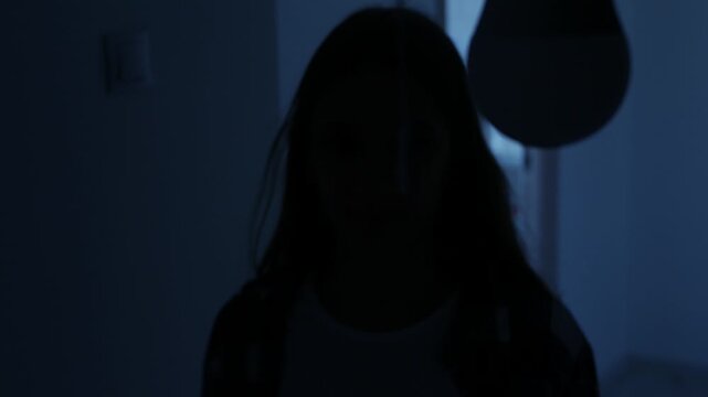 Girl Turn On the Light in a Dark Room, Woman Turning the Light On a Led Bulb, Turns the Light On at Home, Pull Switch On Off